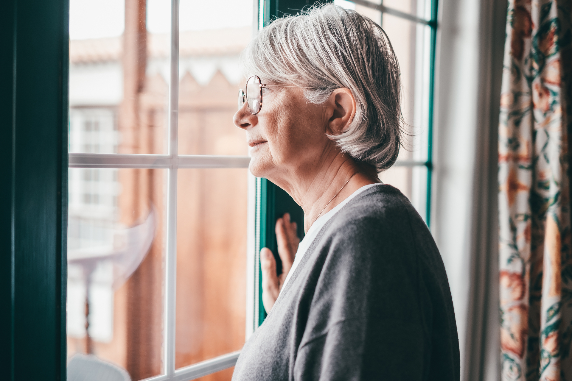 Peaceful senior woman in soft natural light